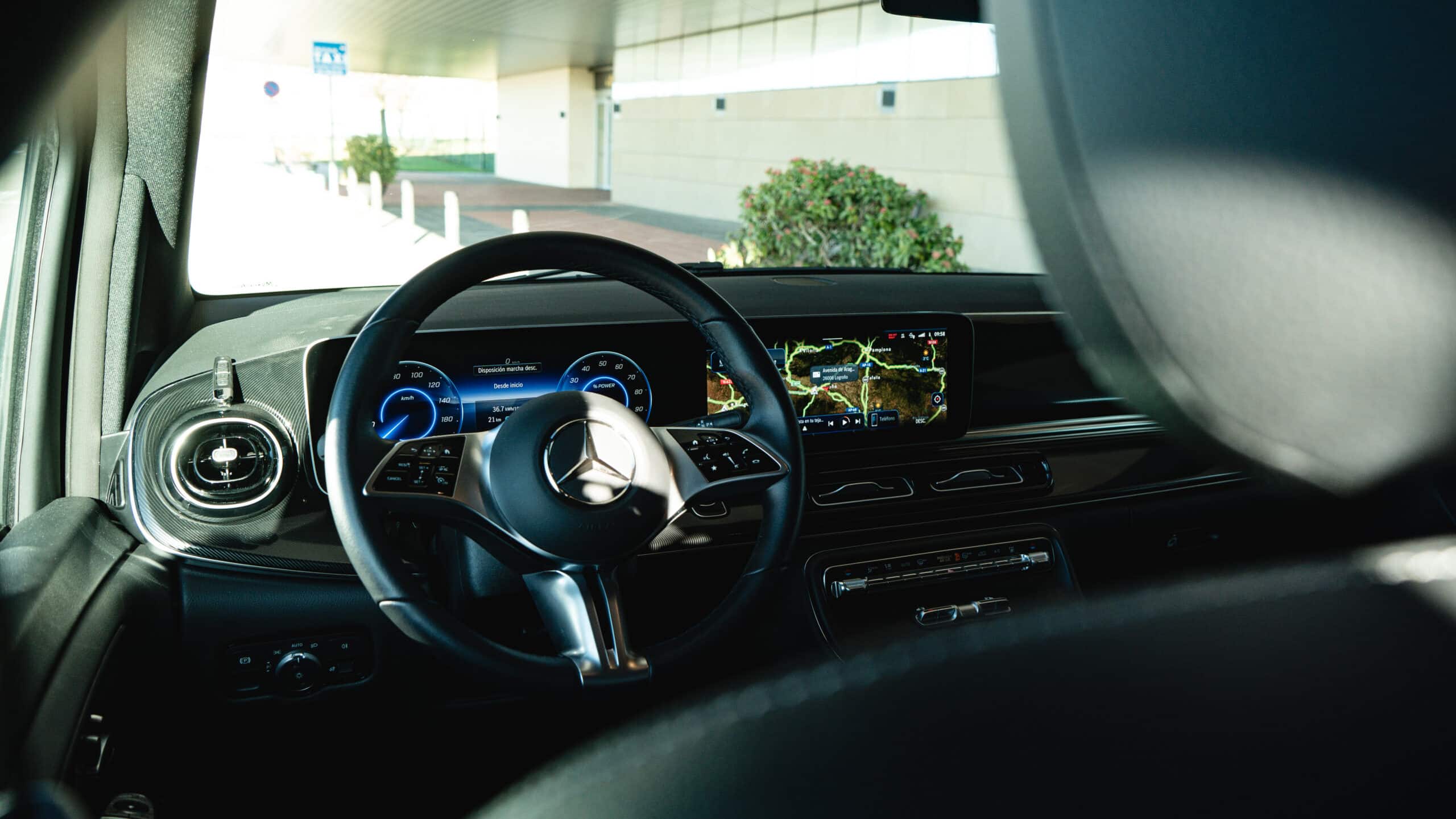 Luxury interior and modern dashboard of a premium Mercedes vehicle used for punctual and discrete private transfers in La Rioja.